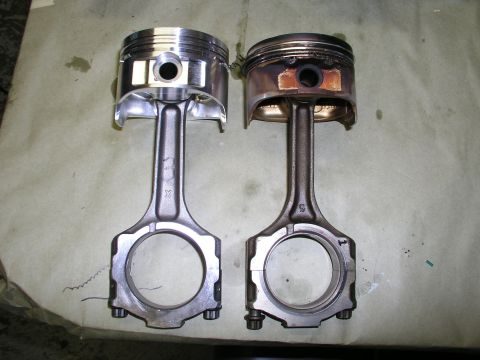 1996 Ford Probe - Comparison of a new piston and connecting rod with a used one.