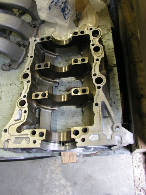 1996 Ford Probe - Engine block casting with bearing caps installed, ready for crankshaft.