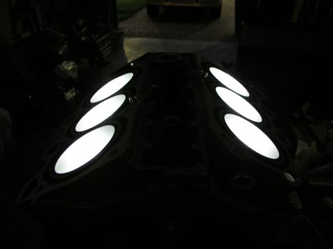 1996 Ford Probe - Engine valve cover with illuminated oval cutouts, possibly for custom lighting.