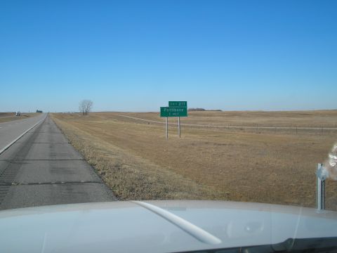 1990 Ford Bronco - Driving on a highway with a sign indicating Exit 217 to Pettibone, 1 mile away.
