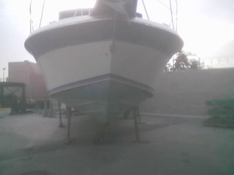 1968 Ford Mustang - Boat on stands, showing its hull and bow section.