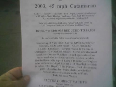1968 Ford Mustang - Dealer sales flyer for a 2003 catamaran listing specifications, options, and reduced price.