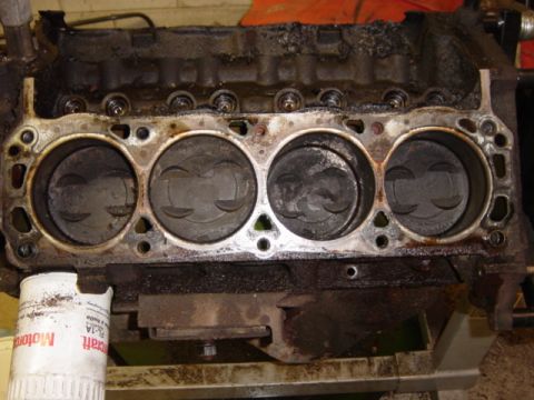 1991 Ford Bronco - Driver's side, gasket stuck to head instead. Notice the huge baked-on carbon deposits up in the lifter valley in this shot and the last --…