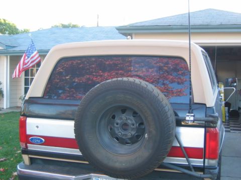 1990 Ford Bronco - Here is the antenna out back. The 3ft is just about right with teh spring tilt base. Sticks out about 1'4" give or take.