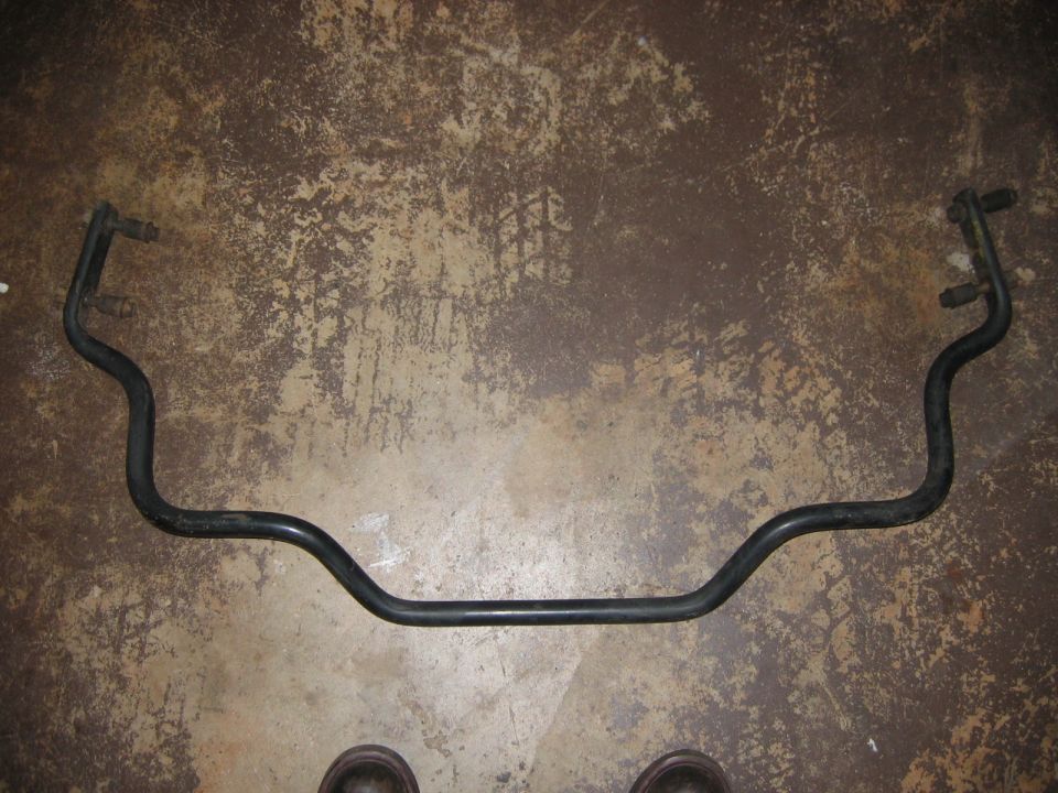 Sway bar with mounting points on a concrete floor