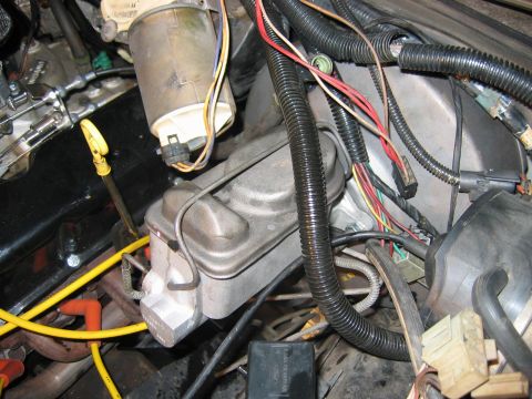 1985 Ford LTD Crown Victoria - Engine bay view showing brake master cylinder and various electrical components.