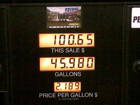 1986 Ford Bronco - A gas pump display shows the total cost, gallons dispensed, and price per gallon.