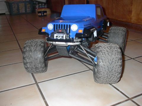 1993 Ford Bronco - This remote-controlled Jeep Wrangler Rubicon is shown from the front with its large off-road tires.