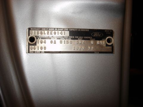 1979 Ford Bronco - Vehicle identification plate showing manufacturing details and the year 1979.