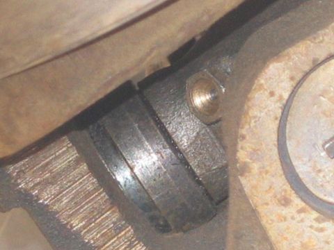 1995 Ford Bronco - Close-up of a vehicle's driveshaft universal joint, showing mechanical components.
