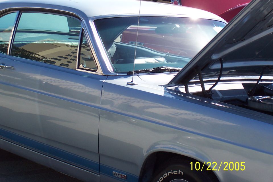 Silver-blue classic Ford with GTA fender badge, hood up, BFGoodrich tire, dated 10/22/2005