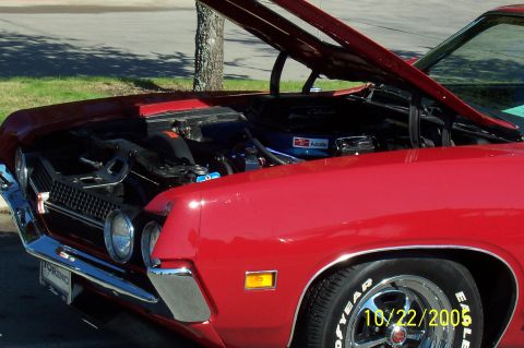 1969 Ford Ranchero - 1969 Ford Ranchero with hood open, displaying the engine bay and front end details.