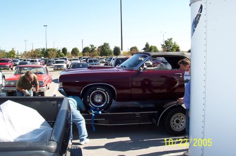 1969 Ford Ranchero - Loading a 1969 Ford Ranchero convertible onto a trailer with assistance.