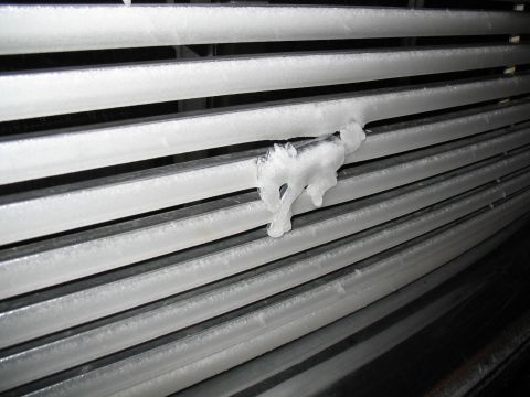 1994 Ford C-350 (Centurion Conversions) - 1/4" of ice on the grill, little Bronco looks cold.