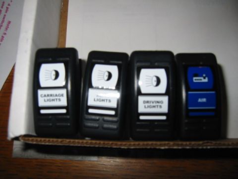 1992 Ford Bronco - Set of four auxiliary car switches for lights and air conditioning.