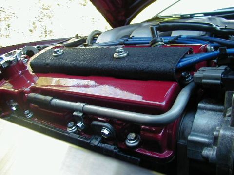 1994 Ford Probe - Engine bay detail showing valve cover and spark plug wires.