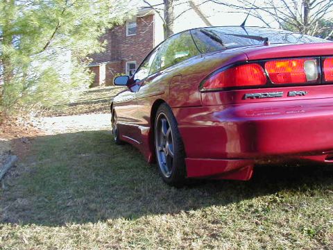 1994 Ford Probe - Rear view of a red 1994 Ford Probe coupe with 'PROBE 24V' badging.