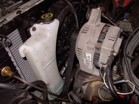 1990 Lincoln Town Car - There's the stock Lincoln overflow tank in position, mounted around the taurus electric fan. Not a bad fit at all.