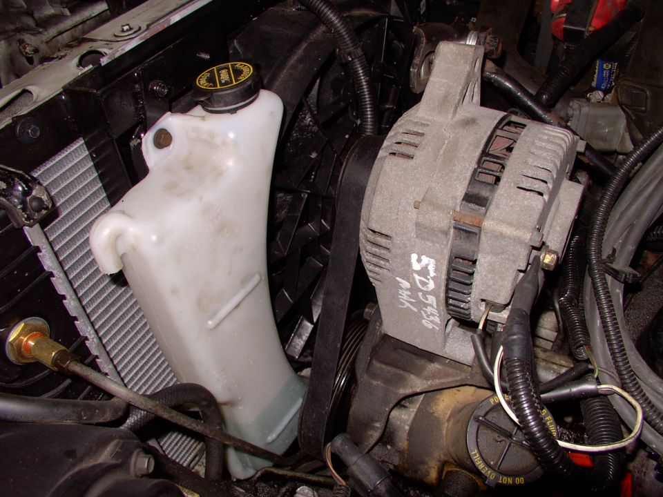 There's the stock Lincoln overflow tank in position, mounted around the taurus electric fan. Not a bad fit at all.