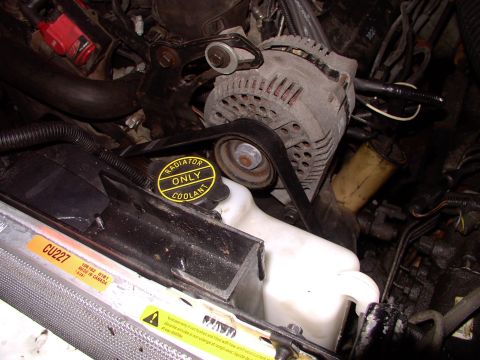 1990 Lincoln Town Car - There's the large case Taurus 3rd generation 130 amp alternator in place. Note the adjustment bracket's slot has been widened enough that i…