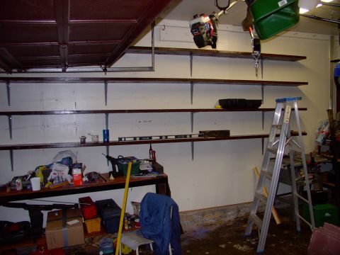 1986 Ford Bronco - Got these up the other day. 16 foot long 2X12s. Four rows all the way to the ceiling.