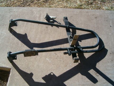 1985 Ford Bronco - This is a spare tire carrier frame, likely for an older SUV or truck.