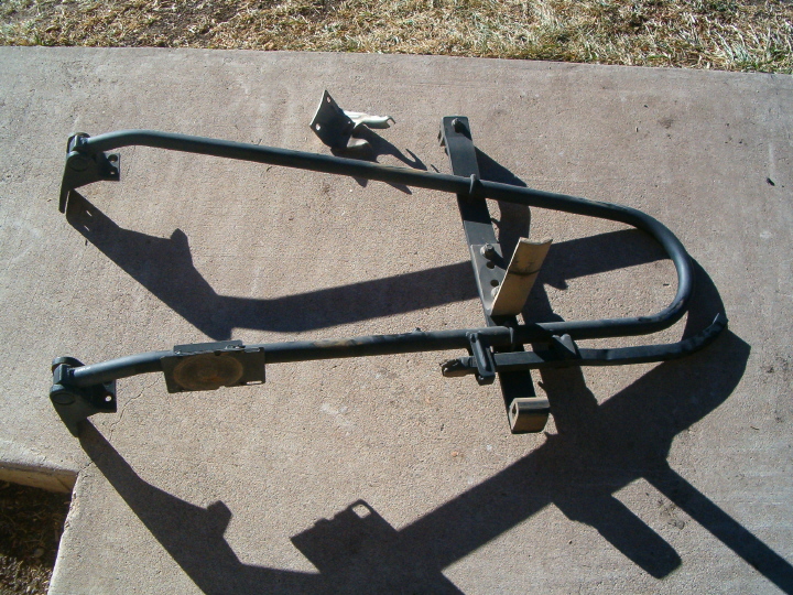 Spare tire carrier frame with mounting brackets
