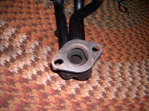 1994 Ford Probe - Close-up of an exhaust manifold part, not a complete vehicle.
