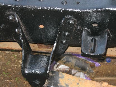 1985 Ford F-350 - Close-up of a painted truck frame component, likely part of the chassis.