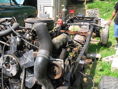 1985 Ford F-350 - The engine and chassis of a green 1985 Ford F-350 are visible in this registry photo.