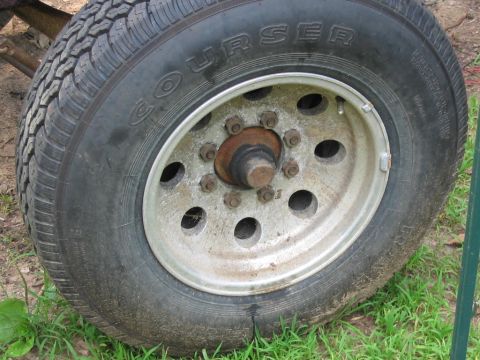 1985 Ford F-350 - A close-up view of a tire and wheel assembly, showing the 'COURSER' branding on the tire.