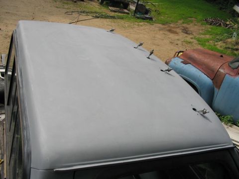 1985 Ford F-350 - Truck roof is prepped for paint, with another vehicle visible in the background.
