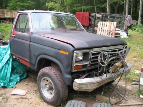 1985 Ford F-350 - This Ford F-350 truck appears to be from the early 1980s, not 1985, with visible body damage.