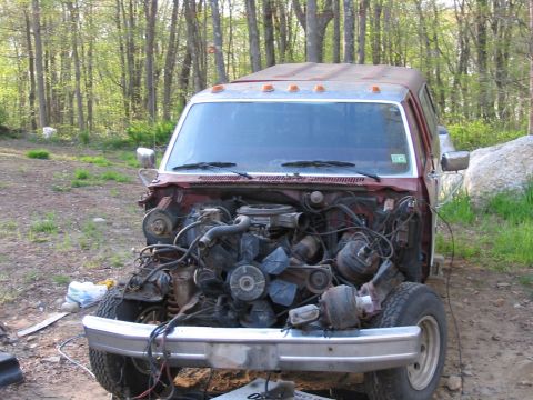 1985 Ford F-350 - This truck is missing its engine and appears to be in a state of disrepair.