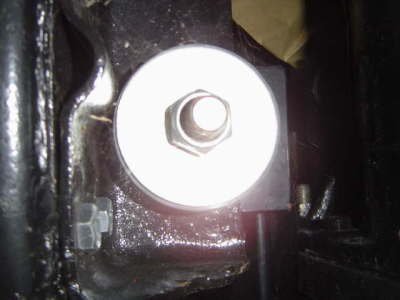 1971 Ford Bronco - This image shows a close-up of a bolt and nut, likely part of an engine mount.
