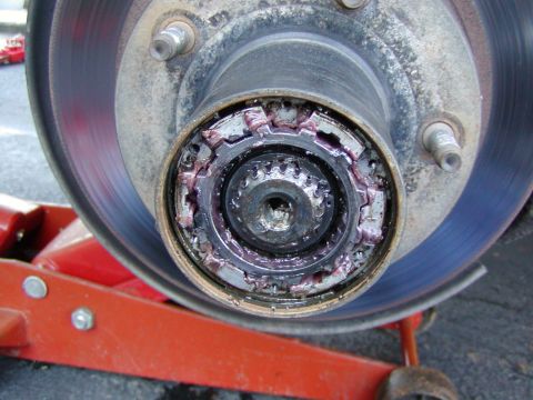 1991 Ford Bronco - hub cover removed. here is the maunual hubs internals. remove the outer ring and inner snap ring