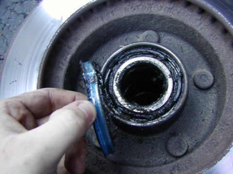 1991 Ford Bronco - pry it off and now you have access to the inner wheel bearing