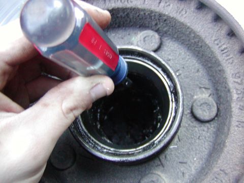1991 Ford Bronco - hammer out the old bearing races. There is a lip for each one. I used a screwdriver.. A punch would have been wiser... Tap them out in a ci…