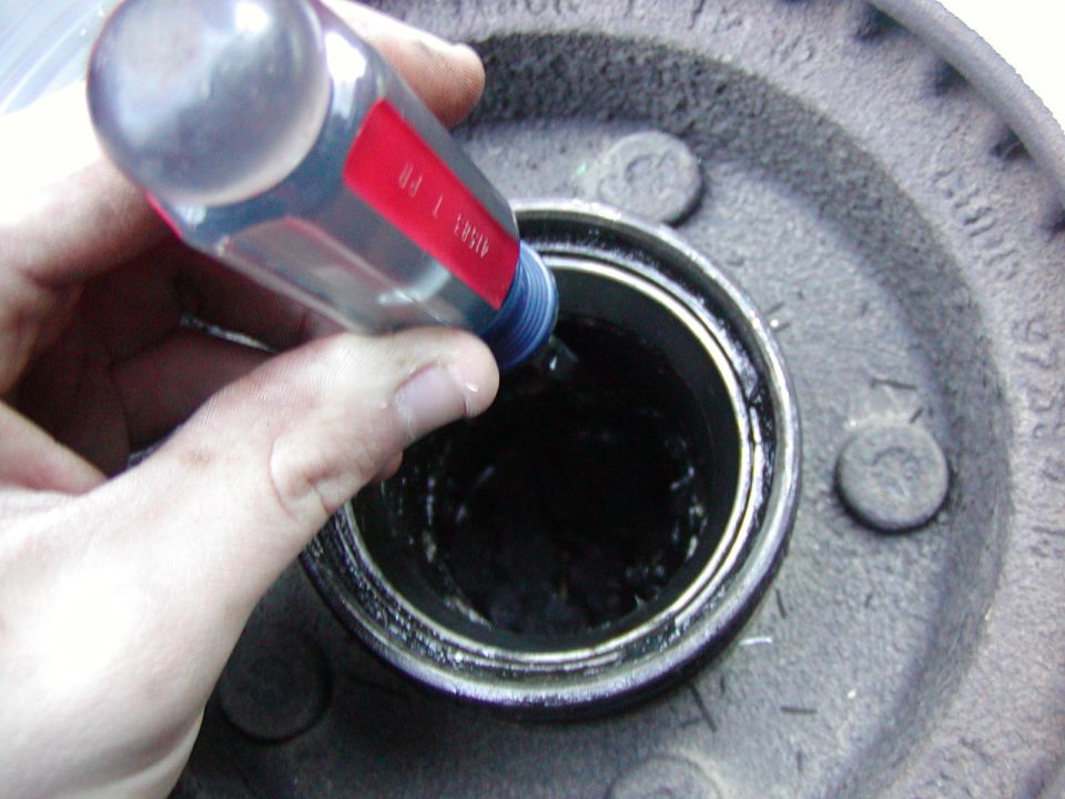 hammer out the old bearing races. There is a lip for each one. I used a screwdriver.. A punch would have been wiser... Tap them out in a circle. Dont just drive one side out...it wont come out