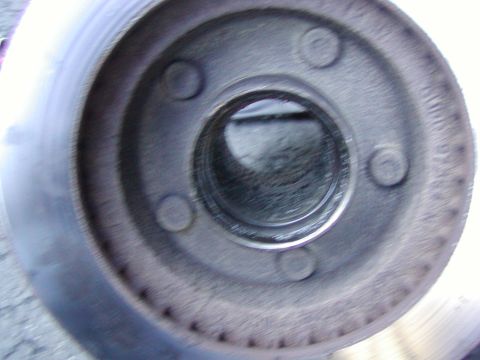 1991 Ford Bronco - both races removed. Now hammer(beat the piss) outta the lug nuts from the top and they will press out here