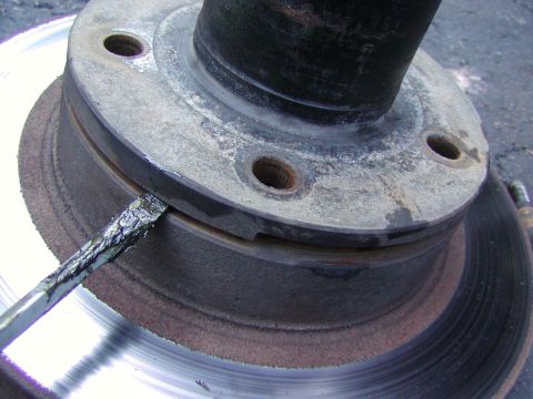 1991 Ford Bronco - pry the hub seperate from the rotor when all lugs are removed