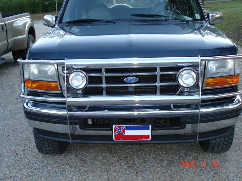 1995 Ford Bronco - Front view of a 1995 Ford Bronco equipped with a chrome brush guard.