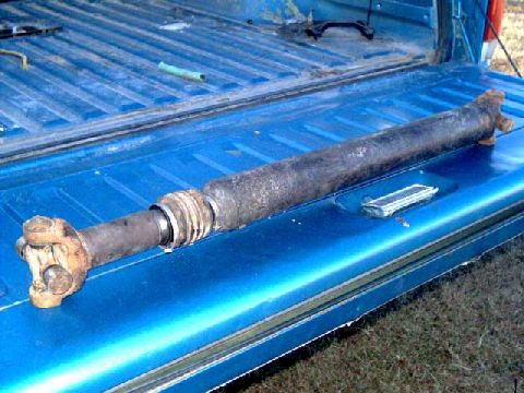 1984 Ford Bronco - front ds- dis-assmbly. remove clips holding rubber boot