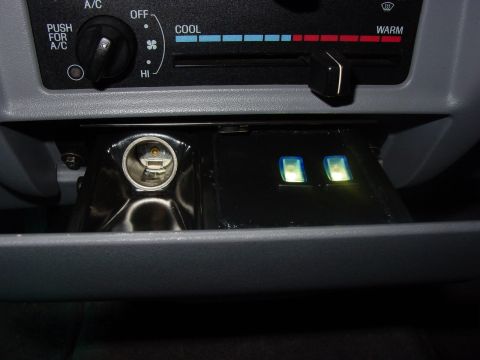 1993 Ford Explorer - Lights controlled by hidden lighted mini switches on a custom pannel in place of the ash tray.