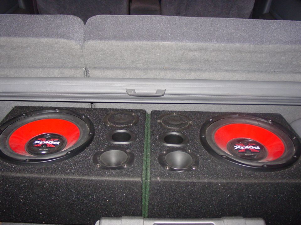 2 10" Sony Explode subs with a 600w amp.  For when I want the music loud.