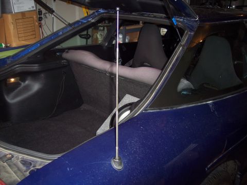 1995 Ford Probe - Interior view of a blue car, focusing on the trunk and rear seating area.