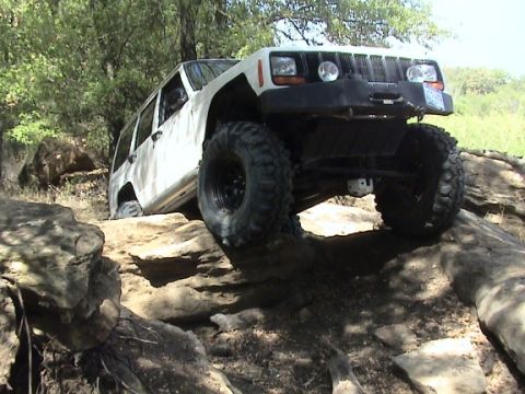 1986 Ford Bronco - This Jeep is navigating a rocky obstacle course.