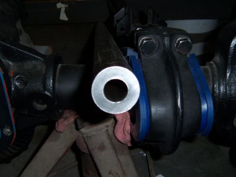 1983 Ford Bronco - Close-up of a steering linkage component, possibly for a Ford Bronco.