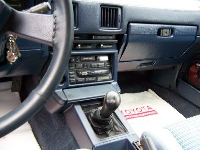 1984 Toyota Celica - center console, Toyota in-the-dash 3 disc CD changer, short shifter and Momo knob