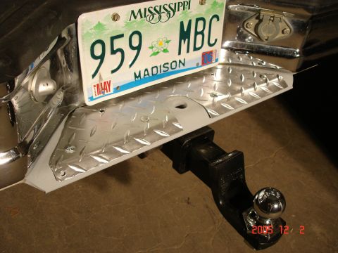 1995 Ford Bronco - A custom rear bumper step. Made out of diamond plate and cut to fit and painted with a weatherproof aluminum finish.